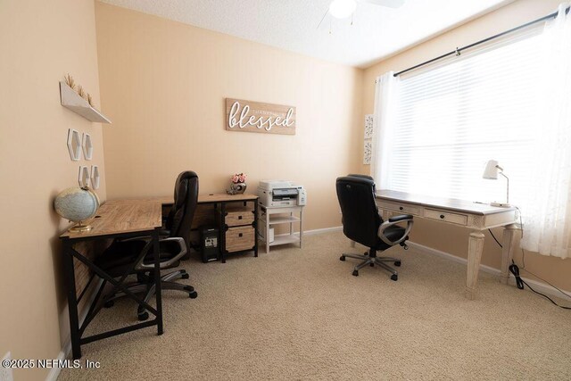 2543 Willow Creek Dr, Fleming Island, FL 32003 - office area featuring carpet, a ceiling fan, and baseboards