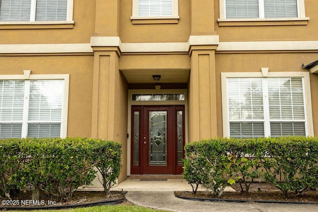 2543 Willow Creek Dr, Fleming Island, FL 32003 - entrance to property featuring stucco siding