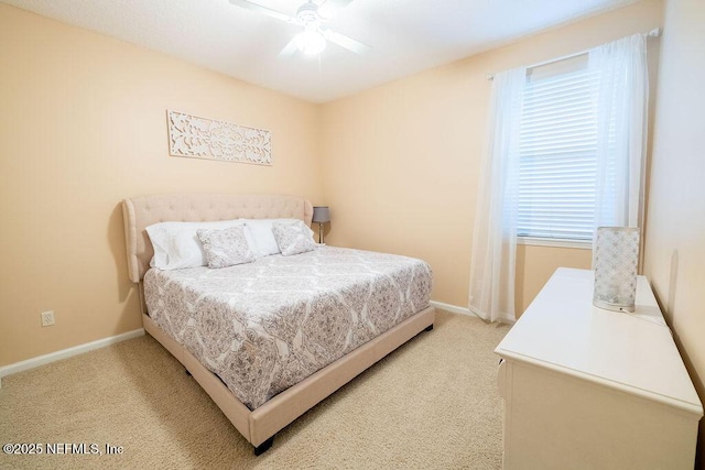 2543 Willow Creek Dr, Fleming Island, FL 32003 - bedroom with light colored carpet, baseboards, and a ceiling fan