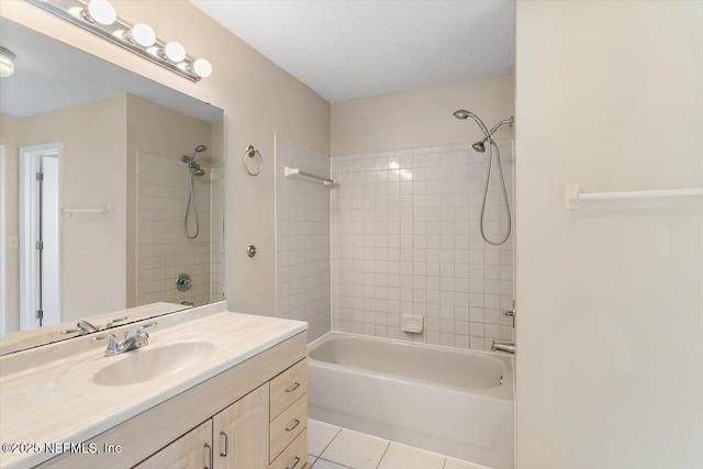 bathroom with shower / tub combination, tile patterned flooring, vanity, and a textured ceiling