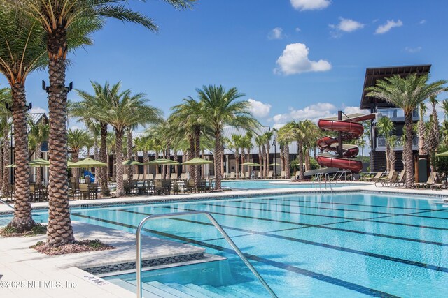 community pool with a water slide