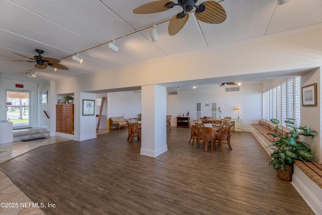 3350 S Fletcher Ave Unit D5, Fernandina Beach, FL 32034 - living area with a ceiling fan, rail lighting, wood finished floors, and a textured ceiling