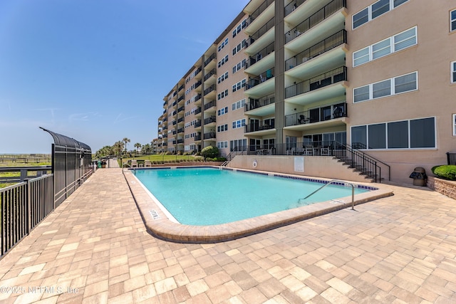 3350 S Fletcher Ave Unit D5, Fernandina Beach, FL 32034 - community pool with a patio