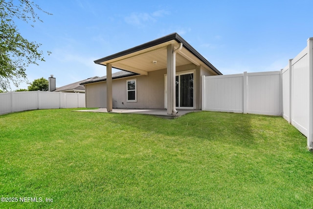 back of house featuring a patio area