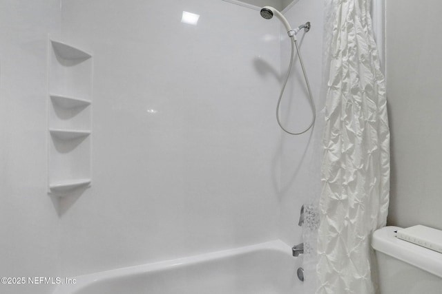 1303 Wood Hill Pl Unit 1303, Jacksonville, FL 32256 - bathroom featuring shower / tub combo with curtain and toilet