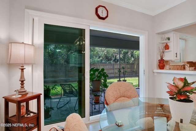 1303 Wood Hill Pl Unit 1303, Jacksonville, FL 32256 - dining area with ornamental molding
