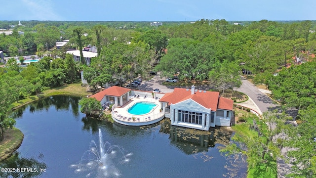 1303 Wood Hill Pl Unit 1303, Jacksonville, FL 32256 - aerial view of a pool and a forest