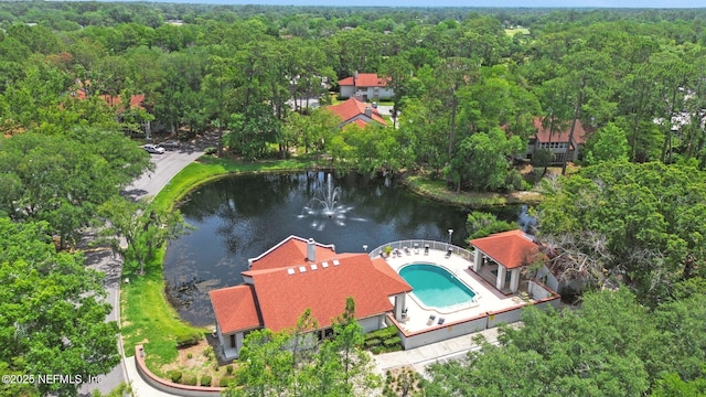 1303 Wood Hill Pl Unit 1303, Jacksonville, FL 32256 - drone / aerial view of a heavily wooded area, a large body of water, and a pool