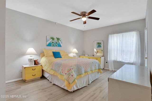 1303 Wood Hill Pl Unit 1303, Jacksonville, FL 32256 - bedroom featuring light wood-style floors, baseboards, and ceiling fan