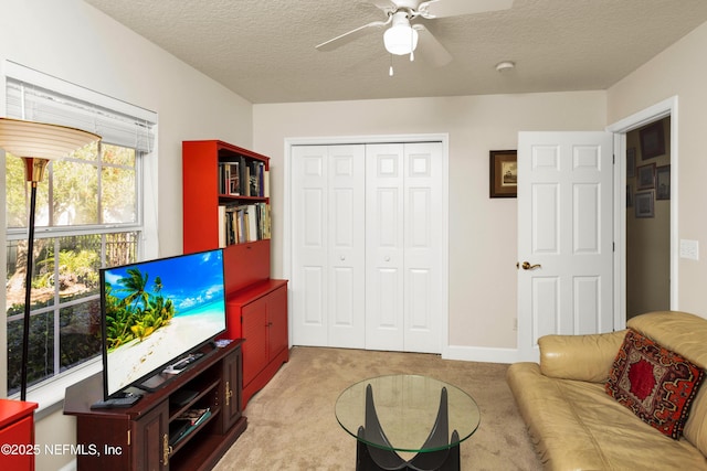 445 W Mill Chase Ct, Ponte Vedra Beach, FL 32082 - living room featuring light colored carpet, ceiling fan, and a textured ceiling