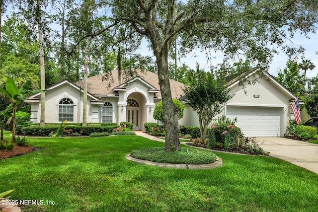 445 W Mill Chase Ct, Ponte Vedra Beach, FL 32082 - view of front of house featuring stucco siding, driveway, a garage, a front yard, and french doors