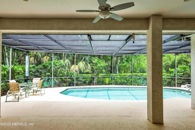 445 W Mill Chase Ct, Ponte Vedra Beach, FL 32082 - outdoor pool with a patio area, a ceiling fan, and glass enclosure