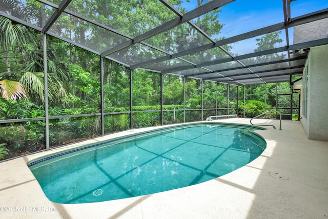 445 W Mill Chase Ct, Ponte Vedra Beach, FL 32082 - swimming pool featuring a patio area and glass enclosure