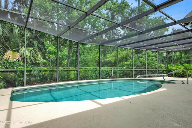 445 W Mill Chase Ct, Ponte Vedra Beach, FL 32082 - outdoor pool with a patio and glass enclosure