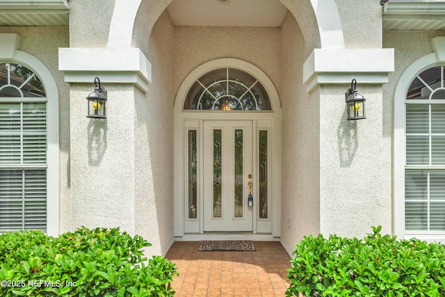 445 W Mill Chase Ct, Ponte Vedra Beach, FL 32082 - doorway to property featuring stucco siding