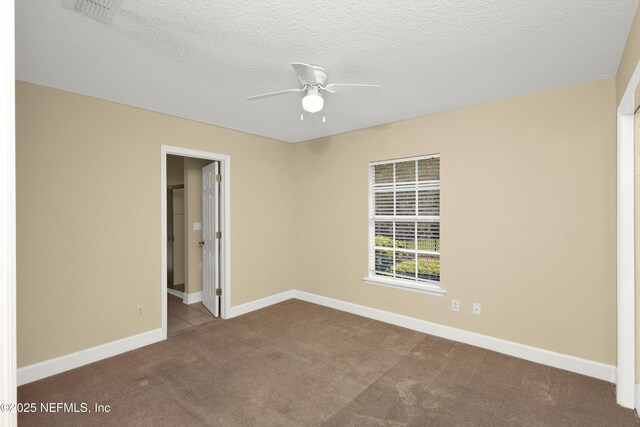 445 W Mill Chase Ct, Ponte Vedra Beach, FL 32082 - unfurnished room featuring carpet flooring, a ceiling fan, baseboards, and a textured ceiling