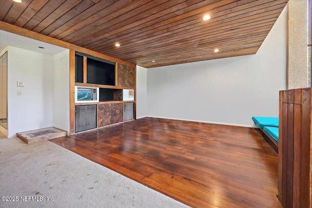 7868 Woodsdale Ln, Jacksonville, FL 32256 - spare room featuring wood ceiling, recessed lighting, baseboards, a fireplace, and wood finished floors