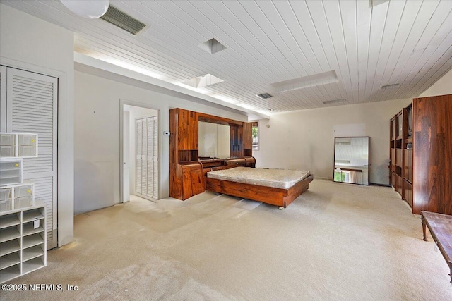 7868 Woodsdale Ln, Jacksonville, FL 32256 - bedroom with light colored carpet and wood ceiling