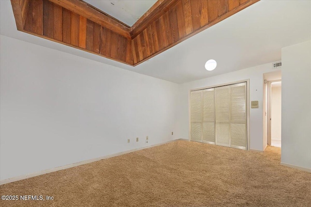 7868 Woodsdale Ln, Jacksonville, FL 32256 - unfurnished bedroom with carpet floors, a closet, and baseboards