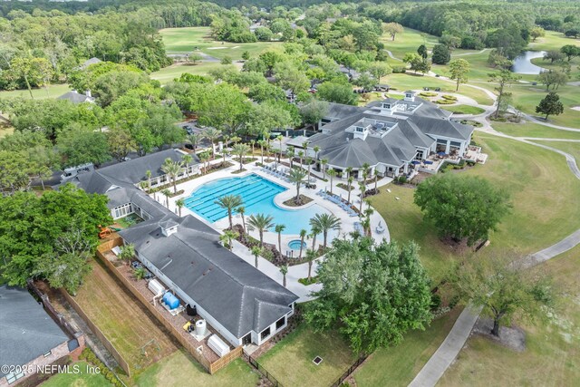 7868 Woodsdale Ln, Jacksonville, FL 32256 - bird's eye view of a pool, a golf course, and a nearby body of water