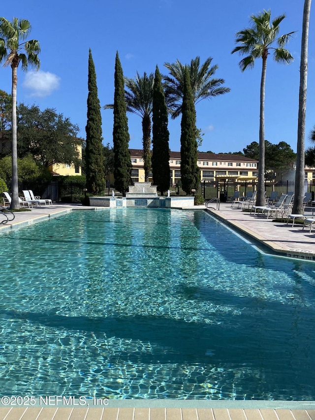 9745 Touchton Rd Unit 1929, Jacksonville, FL 32246 - community pool with a patio area