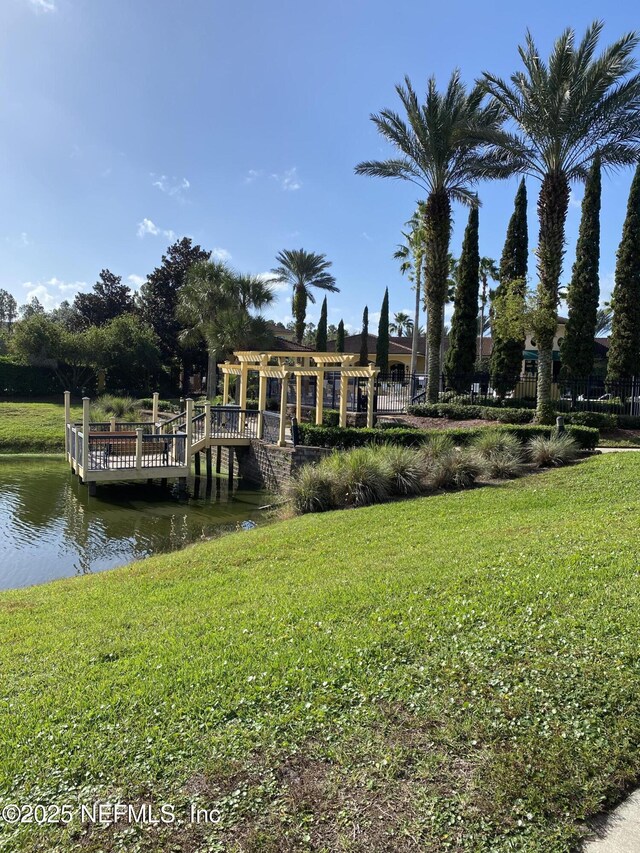 9745 Touchton Rd Unit 1929, Jacksonville, FL 32246 - dock area with a yard and a water view