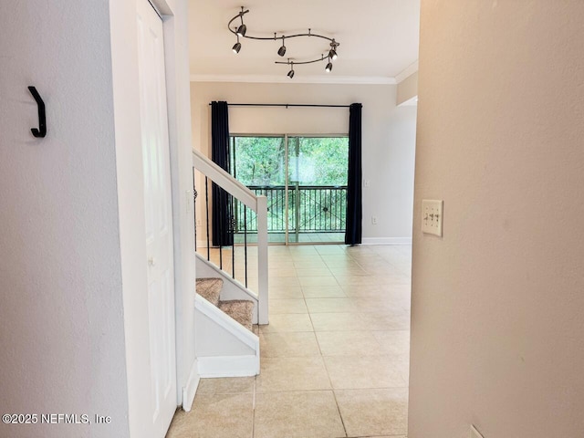9745 Touchton Rd Unit 1929, Jacksonville, FL 32246 - hall featuring ornamental molding, tile patterned floors, stairway, and rail lighting