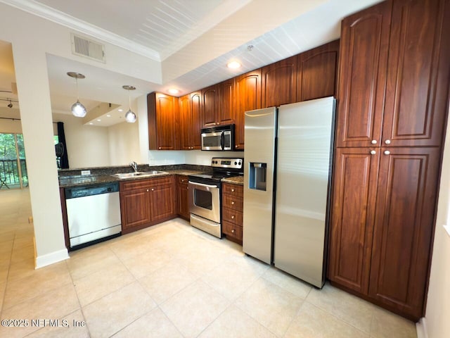 9745 Touchton Rd Unit 1929, Jacksonville, FL 32246 - kitchen with stainless steel appliances, ornamental molding, light tile patterned floors, hanging light fixtures, and dark stone countertops