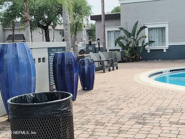 community pool featuring a patio