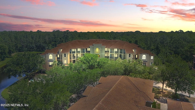 200 Paseo Terraza Unit 203, Saint Augustine, FL 32095 - view of front of house with a wooded view
