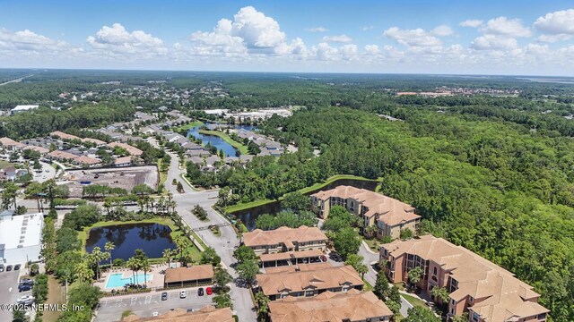 200 Paseo Terraza Unit 203, Saint Augustine, FL 32095 - aerial view of property's location with a nearby body of water, a forest, and nearby suburban area