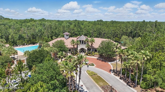 200 Paseo Terraza Unit 203, Saint Augustine, FL 32095 - view from above of property with a forest and a pool