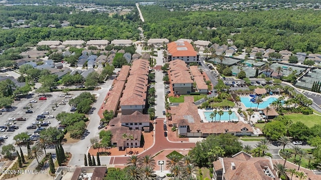 200 Paseo Terraza Unit 203, Saint Augustine, FL 32095 - aerial overview of property's location featuring a pool area and nearby suburban area