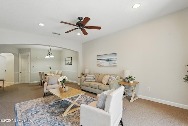 200 Paseo Terraza Unit 203, Saint Augustine, FL 32095 - carpeted living room featuring arched walkways, a ceiling fan, recessed lighting, and baseboards
