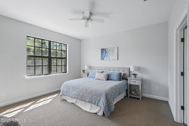 200 Paseo Terraza Unit 203, Saint Augustine, FL 32095 - bedroom featuring carpet floors, baseboards, and ceiling fan