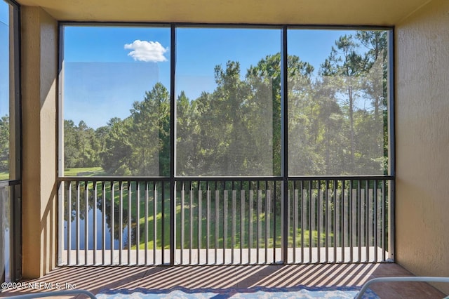 200 Paseo Terraza Unit 203, Saint Augustine, FL 32095 - unfurnished sunroom featuring plenty of natural light