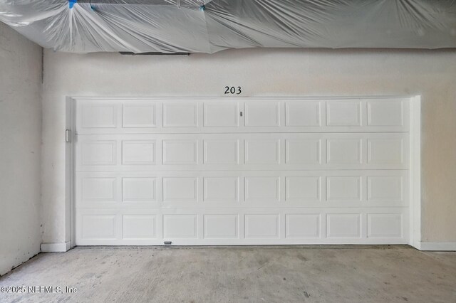 200 Paseo Terraza Unit 203, Saint Augustine, FL 32095 - garage with baseboards