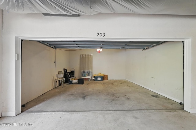200 Paseo Terraza Unit 203, Saint Augustine, FL 32095 - garage with a garage door opener