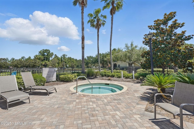 200 Paseo Terraza Unit 203, Saint Augustine, FL 32095 - view of swimming pool with a community hot tub and a patio area