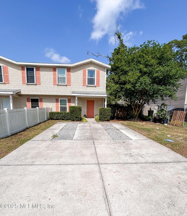 view of property featuring fence