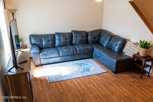 living area with wood finished floors