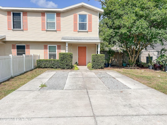 townhome / multi-family property with fence