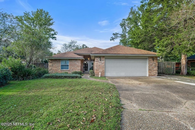 3041 Marrano Dr, Orange Park, FL 32073 - ranch-style home featuring driveway, a garage, and brick siding