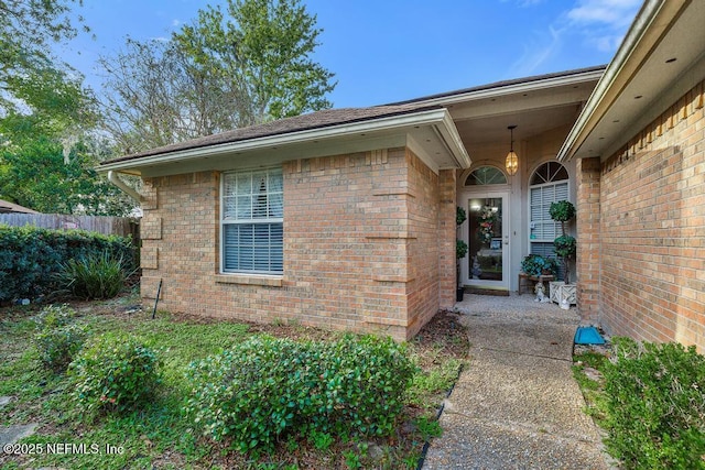 3041 Marrano Dr, Orange Park, FL 32073 - doorway to property with brick siding and fence