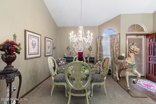 3041 Marrano Dr, Orange Park, FL 32073 - dining space featuring carpet flooring, a chandelier, baseboards, and lofted ceiling