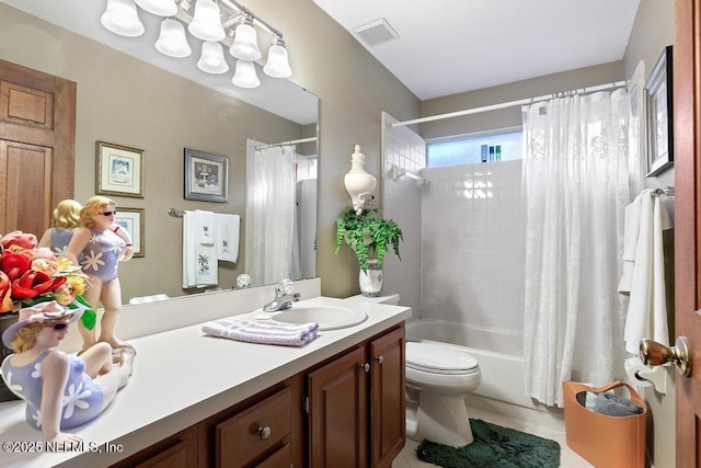 3041 Marrano Dr, Orange Park, FL 32073 - full bathroom featuring vanity, toilet, shower / bath combo with shower curtain, and tile patterned flooring