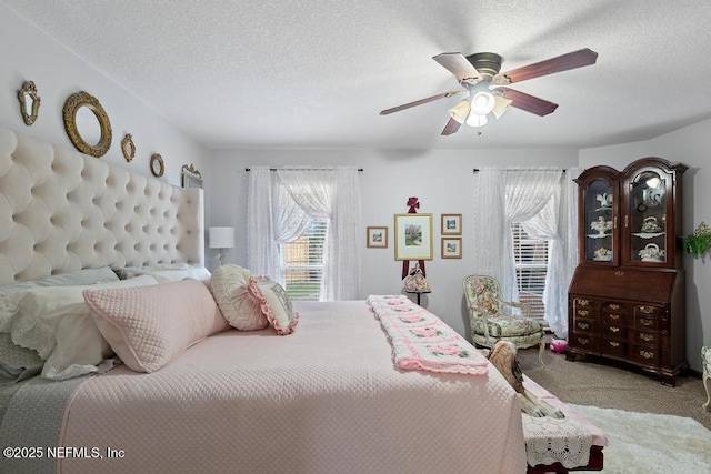 3041 Marrano Dr, Orange Park, FL 32073 - carpeted bedroom featuring ceiling fan and a textured ceiling