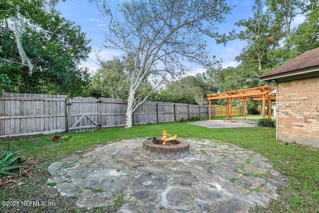 3041 Marrano Dr, Orange Park, FL 32073 - view of yard featuring a patio area, a fire pit, a gate, and a pergola