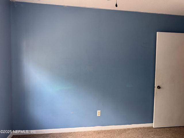 spare room with carpet