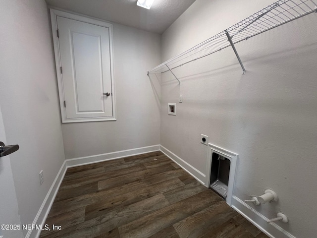 clothes washing area featuring hookup for a washing machine, dark wood finished floors, and baseboards